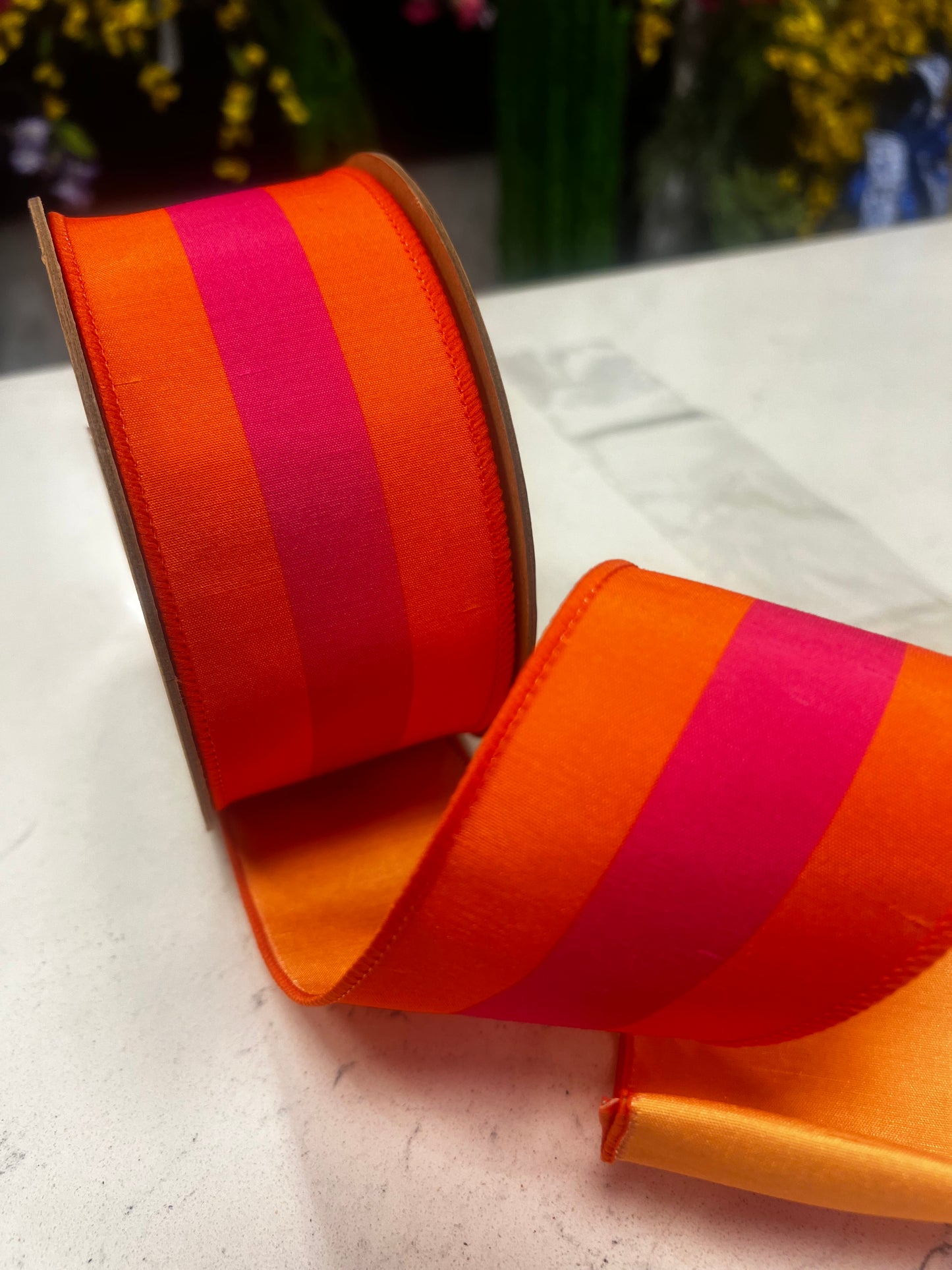Orange with pink stripe wired edge ribbon