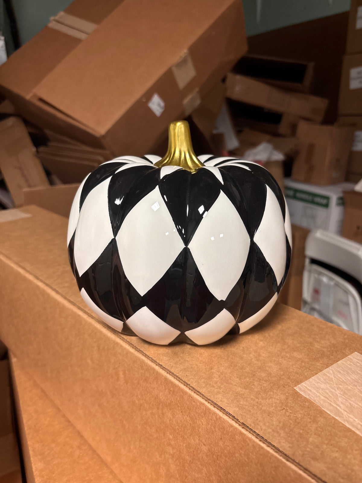 7” Black and white ceramic pumpkin with Gold Stem