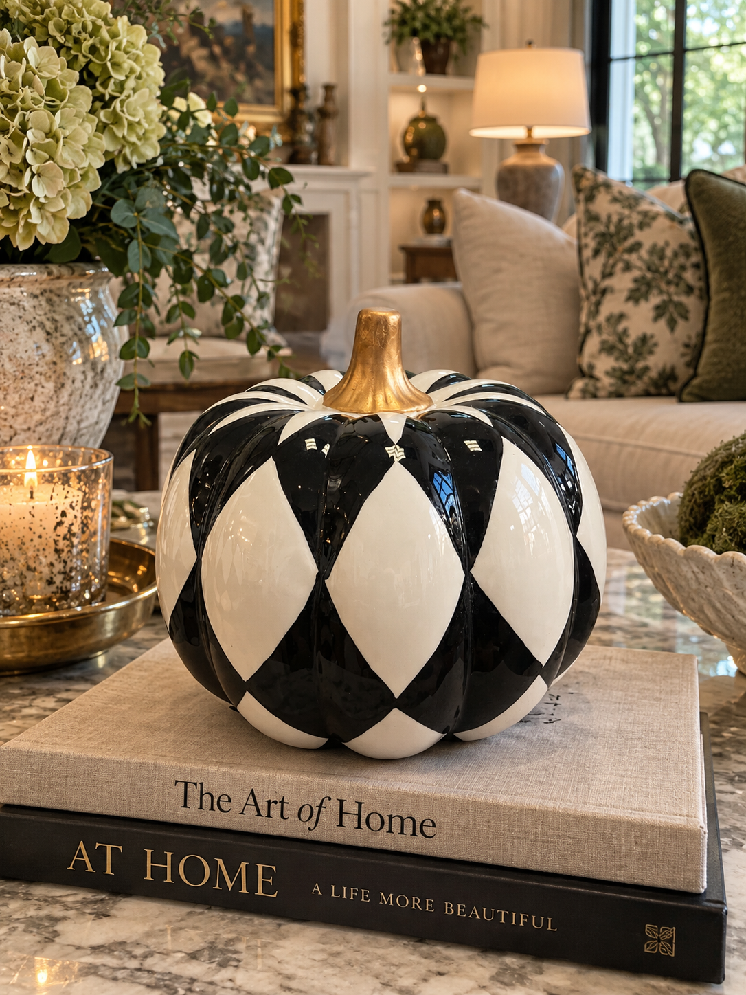 7in Black & White Ceramic Pumpkin with Bronze Stem. ￼