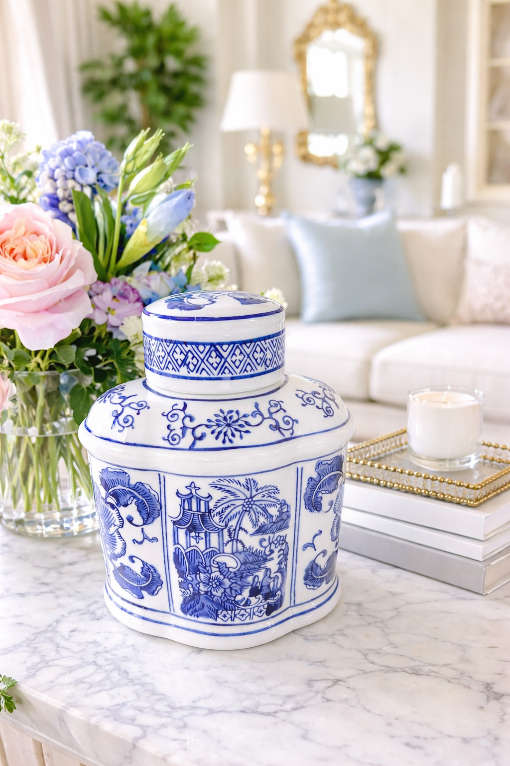 Blue and white oval jar with lid