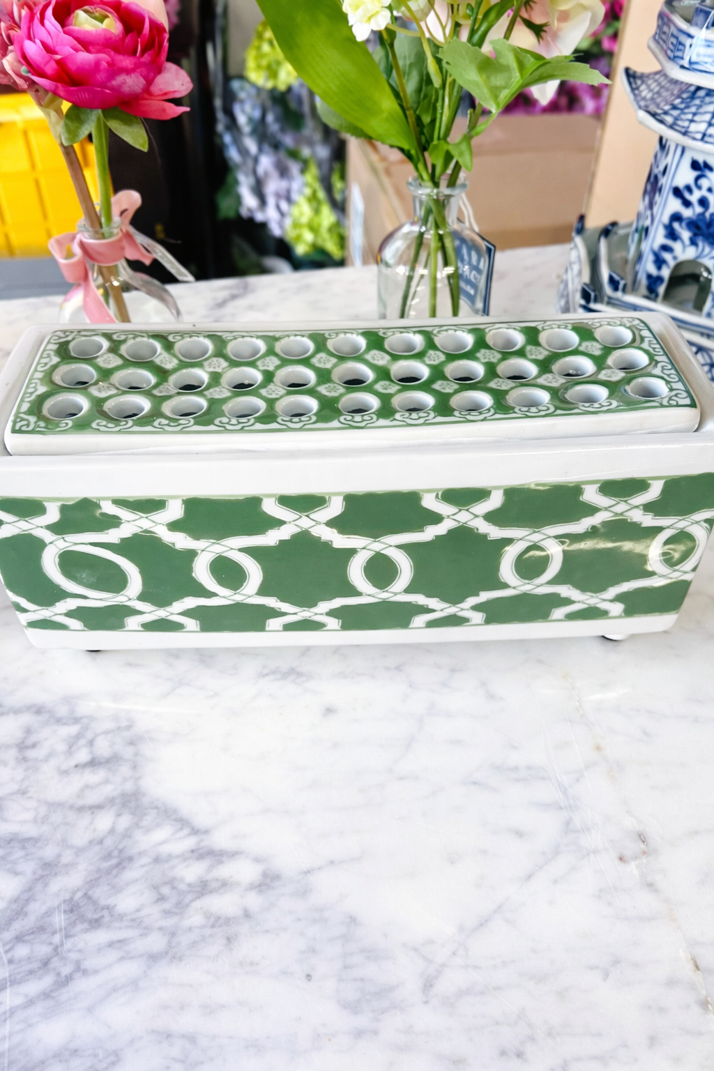 Green and white flower Arranger