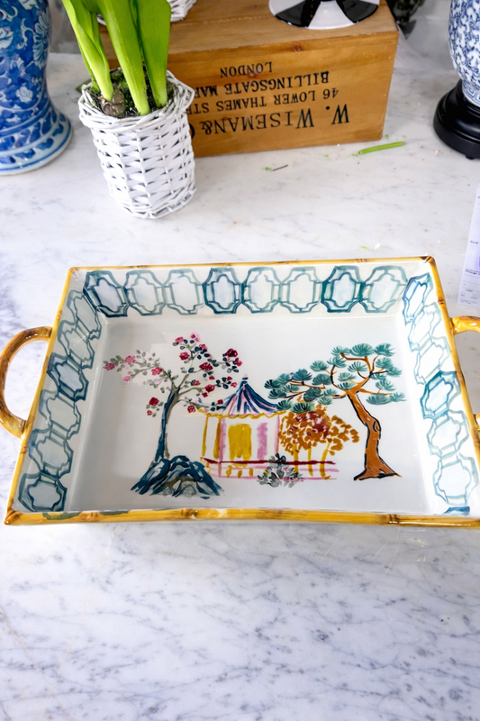 Stoneware baker with house, palm trees, bamboo style edge, and handles