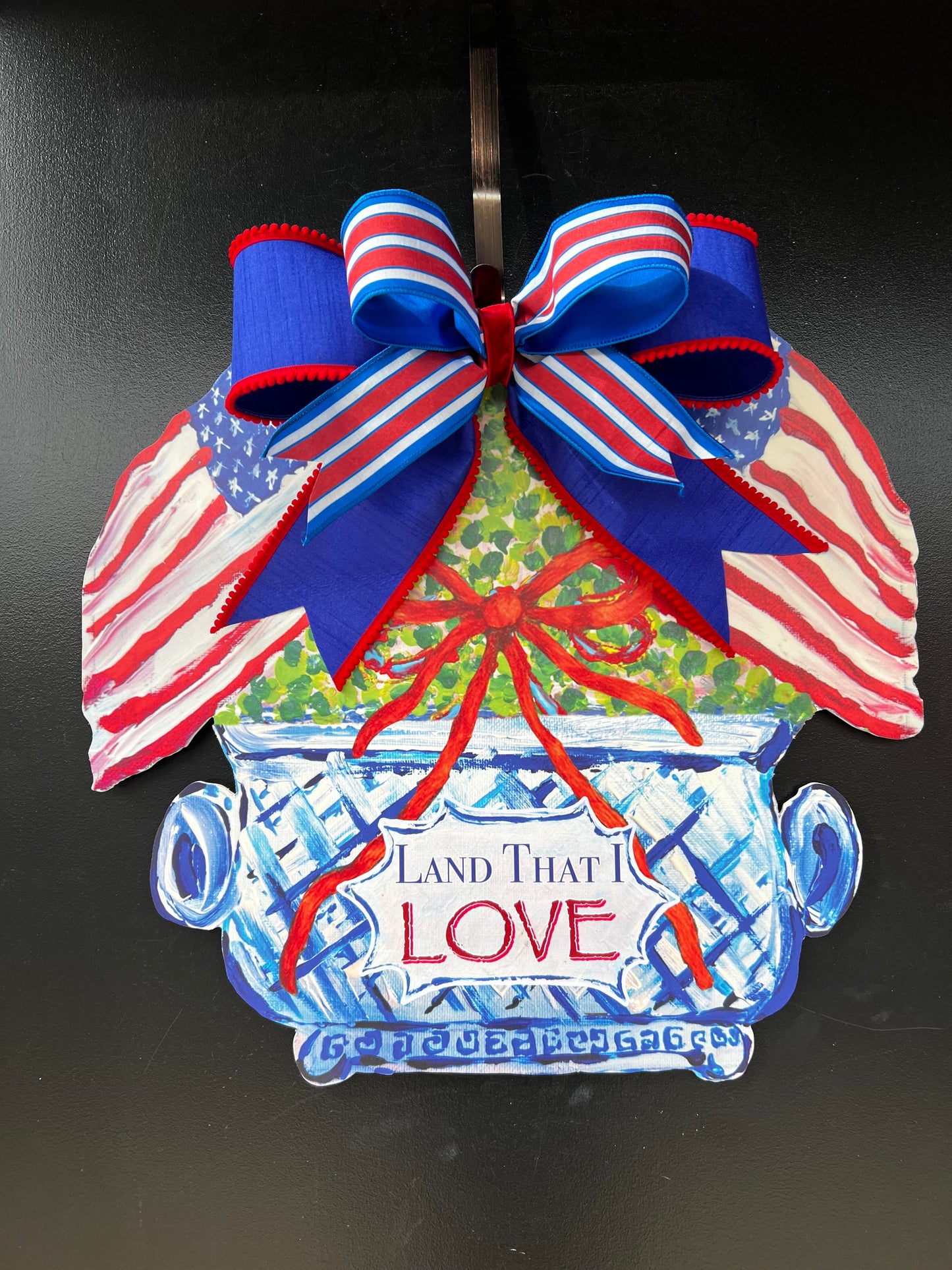 American Topiary Land That I Love Door Hanger With Bow