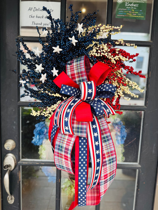 Red White and Blue Berry Wreath with designer bow.